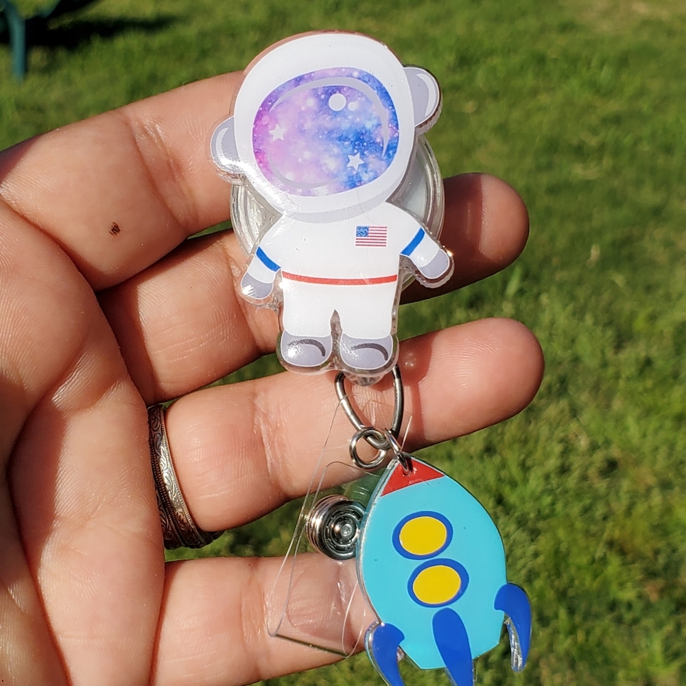 Astronaut And Ship Badge Reel